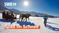 Winter in den Bergen: Spaß im Schnee mit Fondue-Schlitten, Pistenbully und Fahrrad | Treffpunkt